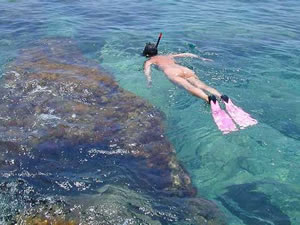 Nude snorkeler in Cairns