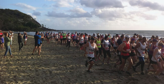 Half-Marathoners start their race on Four Mile Beach at this 2013 Great Barrier Reef Marathon Festival, on November 3.