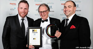 James Wilkinson (left) and Adam Daff (right) present the Hall of Fame Award to David Seargeant.