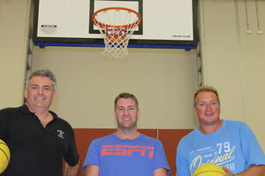 Perth Wildcats coach, Trevor Gleeson (centre), inspects Port Douglas’ cyclone shelter and basketball stadium with Douglas Heat’s Steve Hull (left) and Nick Gibson (right). The Newsport | Port Douglas and Mossman News First
