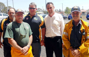 Member for Cook David Kempton (centre) with volunteers from the Rural Fire Brigade Services across the Tableland. PIC Cook Electorate Office