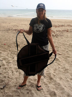 (Above) Tangaroa Blue's Heidi Taylor with the group's new small turtle rescue stretcher. PIC Emma Groves