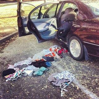 The car broken into on Wharf Street, with strewn personal property. PIC Rosie Wang