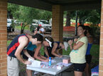 Organiser Sarah McConnell helping the contestants register for Port Douglas Charity Fun Run