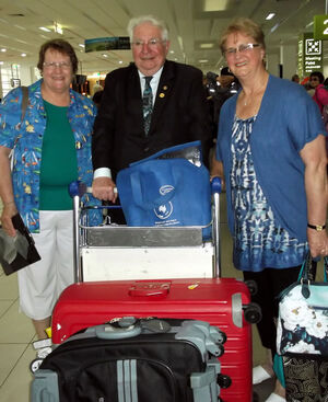 Cairns zone Lions president, Rachael Davies (left) welcomes Lions International president, Barry Palmer and his wife Anne at Cairns Airport ahead of a week of activities in Mossman and Port Douglas.