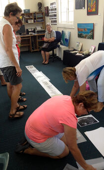 The women admire their work side by side for the first time.