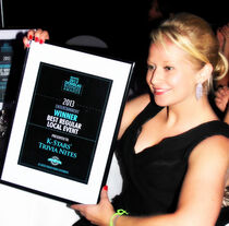 Emma Groves, accepting on behalf of Kevin 'K-Star' Eldridge.