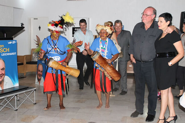 A Papua New Guinean dance troupe performed after Warren Entsch's (above, with wife Yolonde) seat was declared | The Newsport